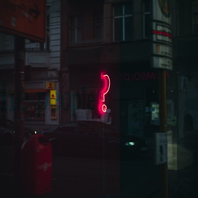 Neon question mark.